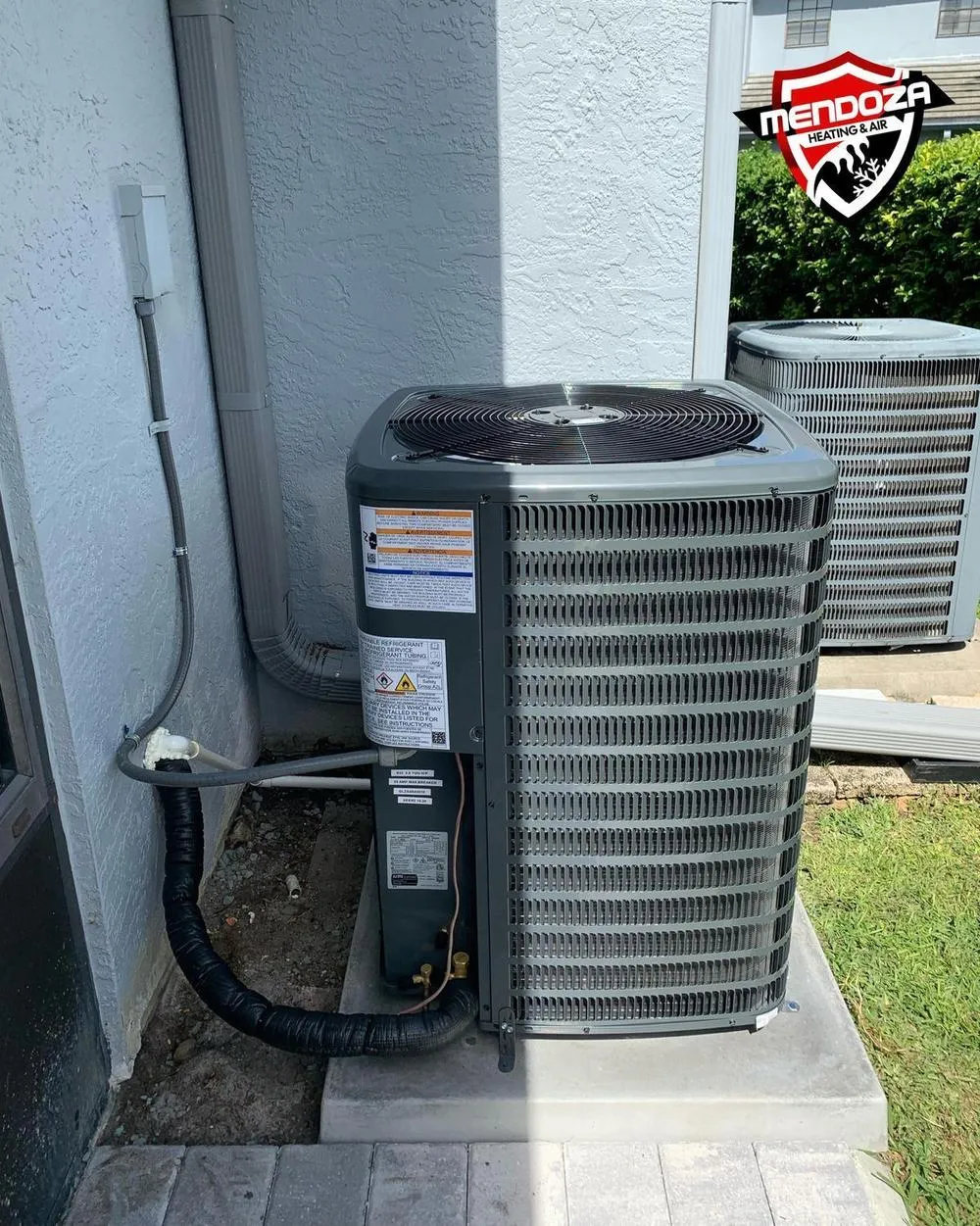 Air conditioner repair in progress by Mendoza Heating and Air in Carrollwood, FL