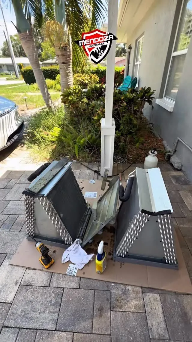 Old condensers removed during a replacement by Mendoza Heating and Air in Land O' Lakes, FL