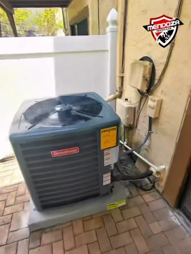 Condenser on a paver patio installed by Mendoza Heating and Air in Brandon, FL