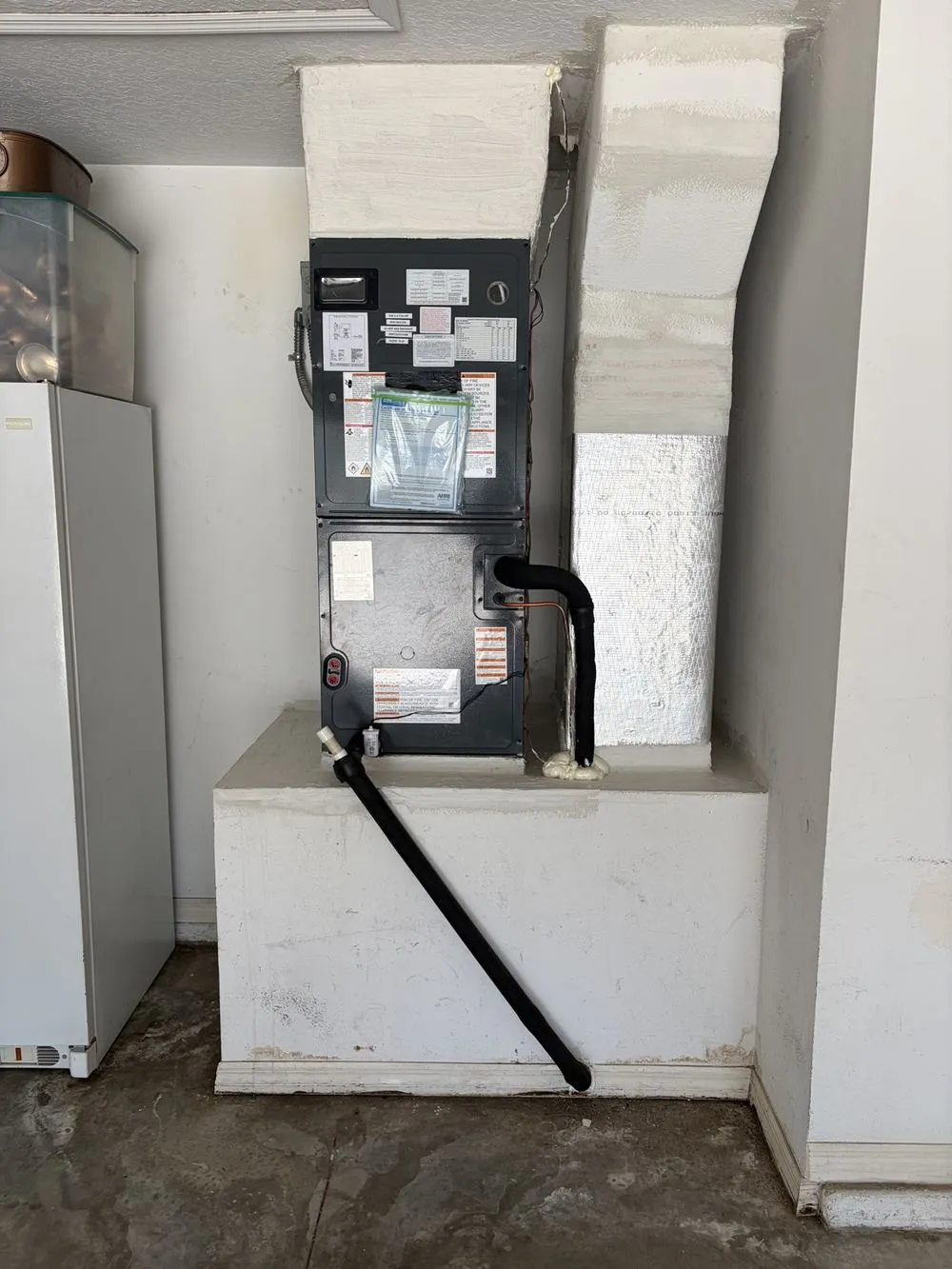 Air handler serviced by Mendoza Heating and Air in a Valrico garage