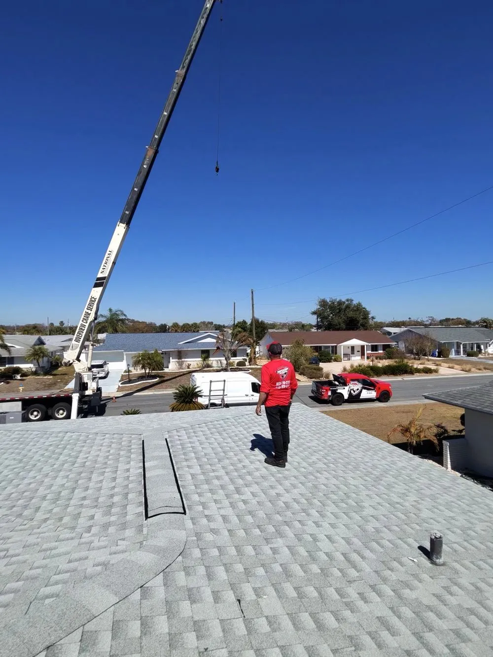 New system lifted into place by Mendoza Heating and Air in Temple Terrace, FL