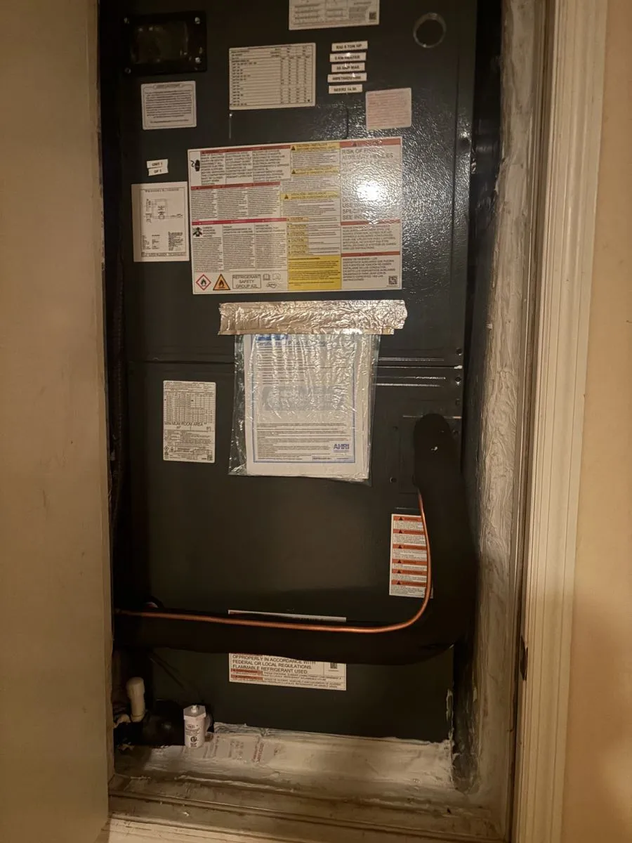 Indoor heating and air handler serviced by Mendoza Heating and Air