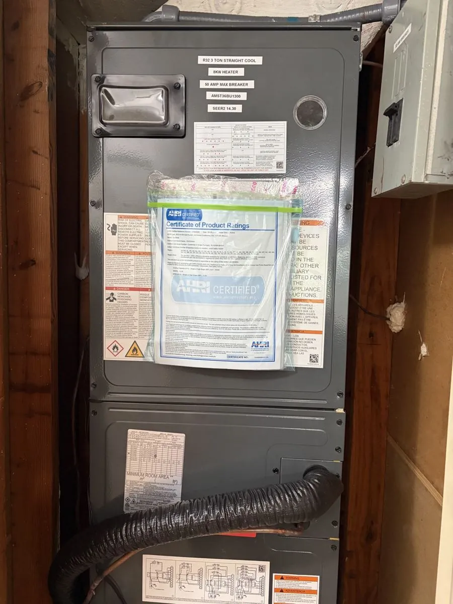 Indoor air handler and ductwork serviced by Mendoza Heating and Air
